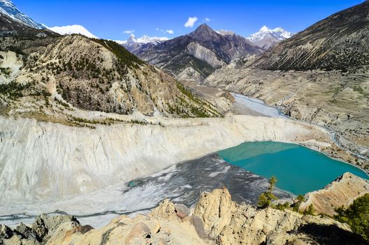 Himalayas mountain range and Gangapurna mountain lake, Nepal