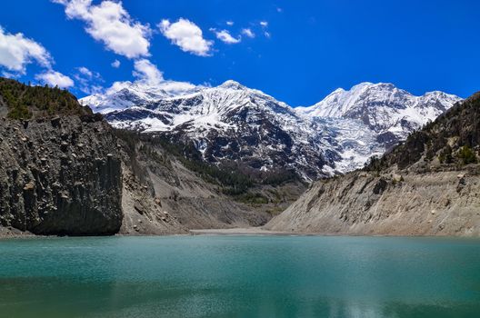 Himalayas mountain peaks and lake in Annapurna area - Gangapurna lake, Nepal