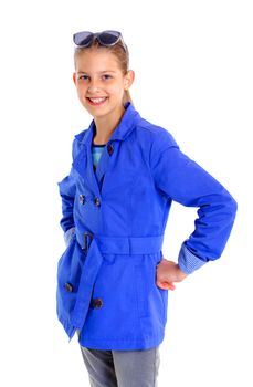 Portrait of a girl with sunglasses and wearing blue clothing. Isolated on white background