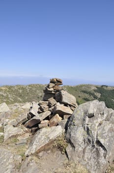 stones on top of the Montseny saying it is the top