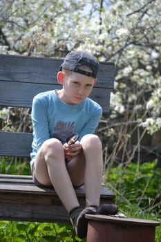 the teenager observes through magnifying glass