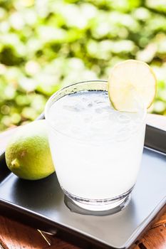 Cold glass of lime juice soda with lime