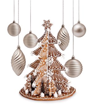 Decorative gingerbread tree and warm silver Christmas decoration balls