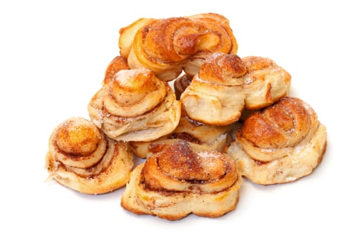 Fresh appetizing sweet rolls, on white background