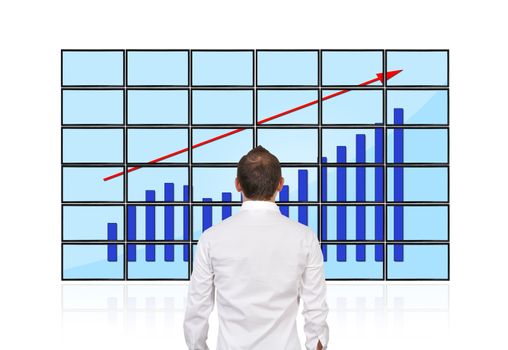 businessman looking on  flat panels with growth chart