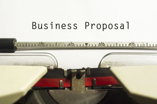 concept of business proposal, with message on typewriter.