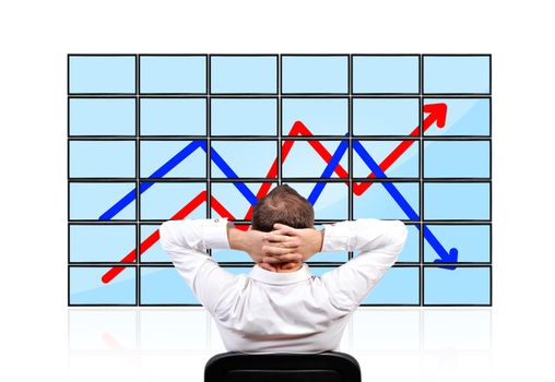 man looking on  flat panels with growth chart