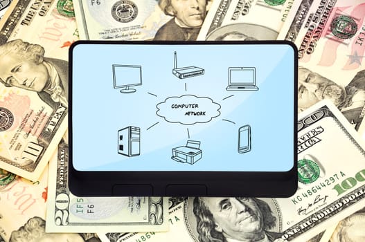 tablet with wireless scheme on background of dollars