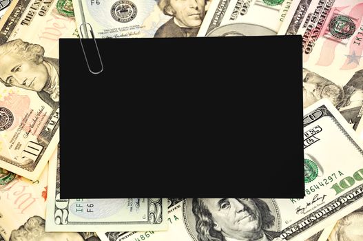 black paper on money background