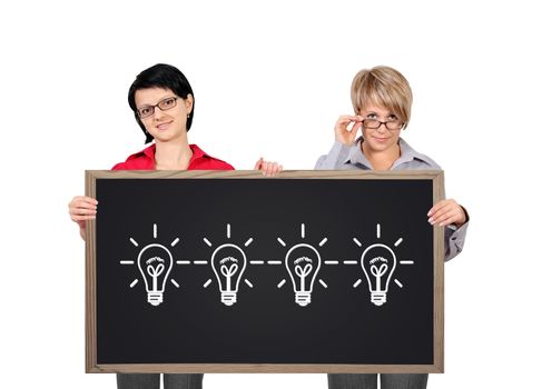 two businesswoman holding a blackboard with lamps