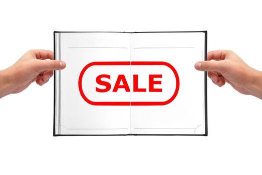 white book with sale symbol in hands