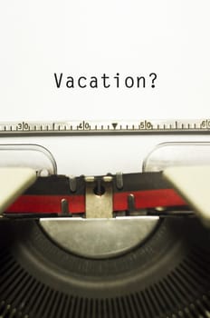 concepts of vacations from work, with message on typewriter.