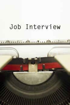 concept of job interview, with message on typewriter.