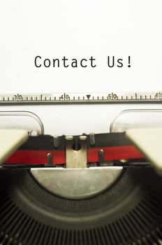 contact us concepts, with message on typewriter paper.