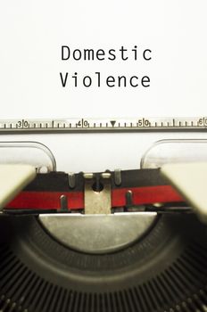 domestic violence concept, with message on typewriter paper.