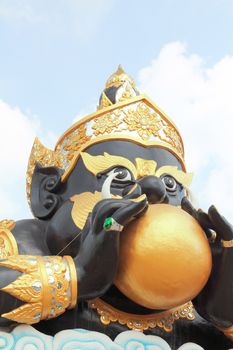 Phra Rahu statue, who is the mythical god of darkness, located in public temple of Thailand