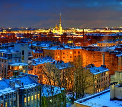 ST-PETERSBURG, RUSSIA - JANUARY 16:  View from above the city at night, January 16, 2012. Residential neighborhood in the historic center. Cathedral of Peter and Paul Fortress in St. Petersburg