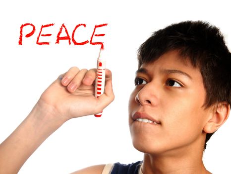 Boy writing the Peace word by the red on a white