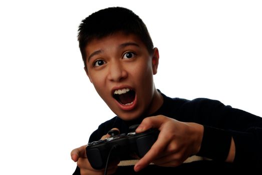 Photo of the boy plaiyng in computer hame with joystick