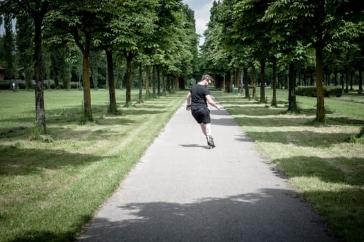 stylish man in the park in a sunny day