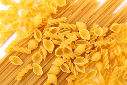 A different pasta are located on the antire background