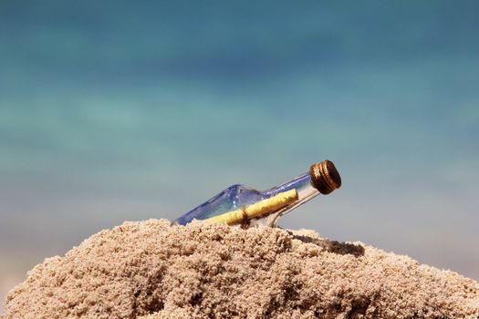 Message in the bottle on blue background