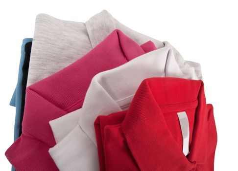 stack of man's and woman's polo t shirts