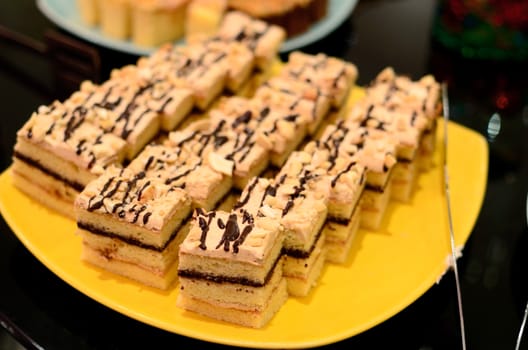 Cake in yellow dish, Coffee break concept