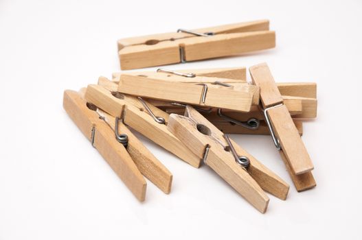 clothes pegs on a white background