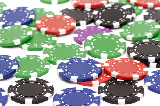 Poker chips on white background