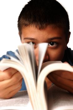 Photo of the young boy with interesting book
