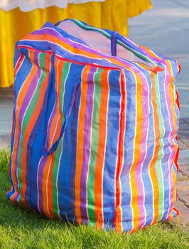Multi color plastic bag with zip in sunlight