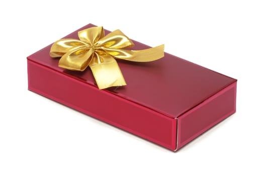 Red gift box decorated with golden bow