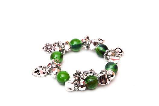 bracelet green balls on a white background