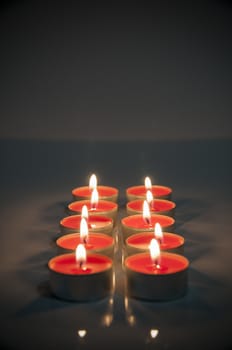 illuminating red color candles wall