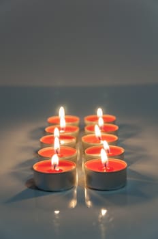 illuminating red color candles wall