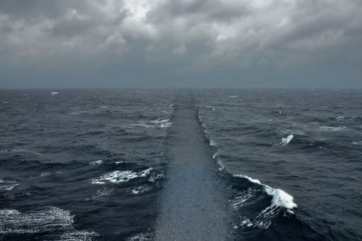 Ocean water dry ground path. Biblical sea crossing religion and faith abstract.