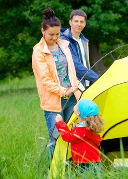 Family with doing camping in the park