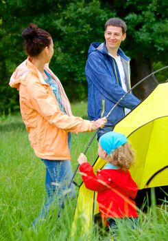 Family with doing camping in the park