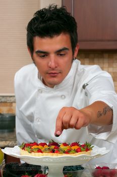 Chef making fruit tarts