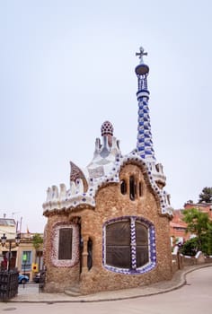 Entrance pavilion of the Park Guell, designed by Antonio Gaudi, in Barcelona, Spain