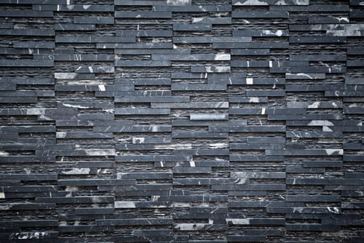 old black brick wall pattern as background