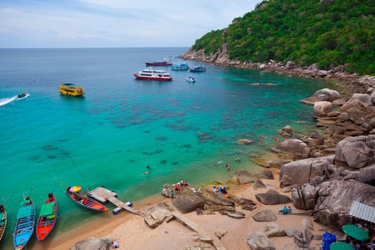 Aerial view of tourists snorkeling in the ocean