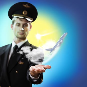 pilot in the form of extending a hand to a flying airplane with sky, clouds and sun