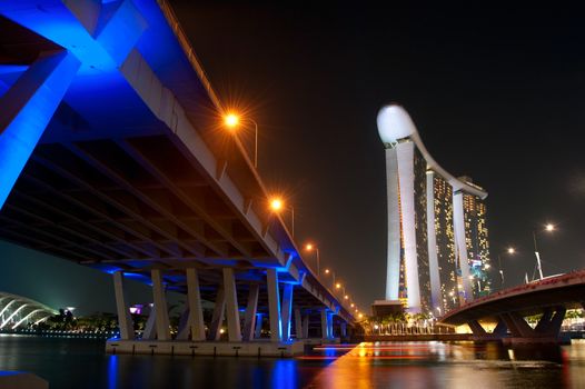 SINGAPORE - MARCH 06: Marina Bay Sands Resort at night on March 06, 2013 in Singapore. It is billed as the world's most expensive standalone casino property at S$8 billion