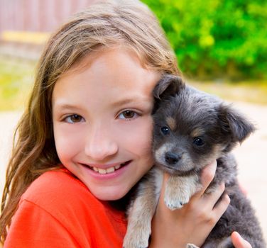 Beautiful kid girl portrait with puppy chihuahua gray dog