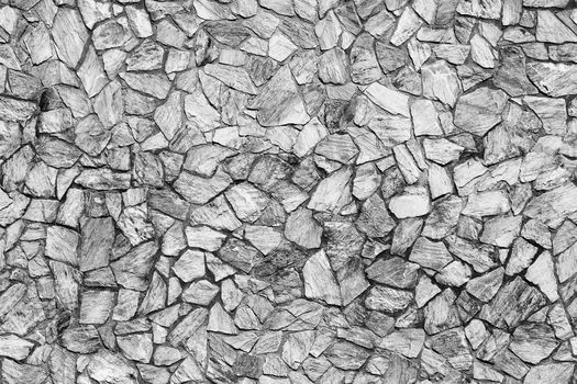 Seamless background of stone wall texture close up