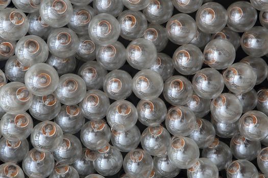 Eco energy saving light bulb , one glowing compact fluorescent lightbulb