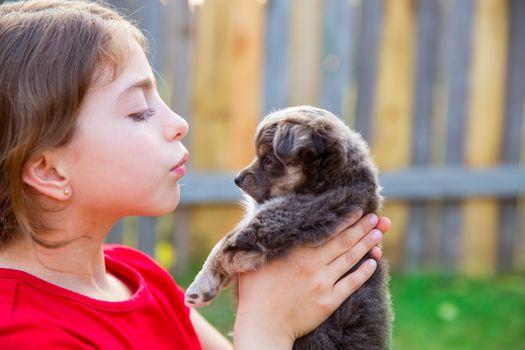 Beautiful kid girl portrait with puppy chihuahua gray dog