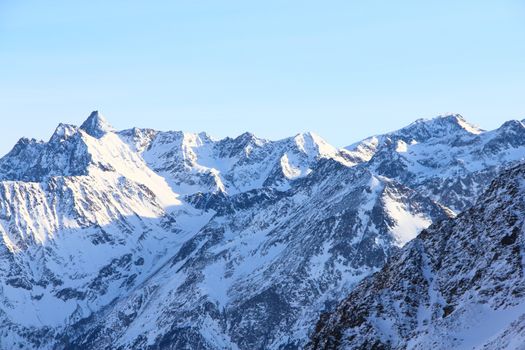 Hight mountains under blue sky beautiful winter panorama